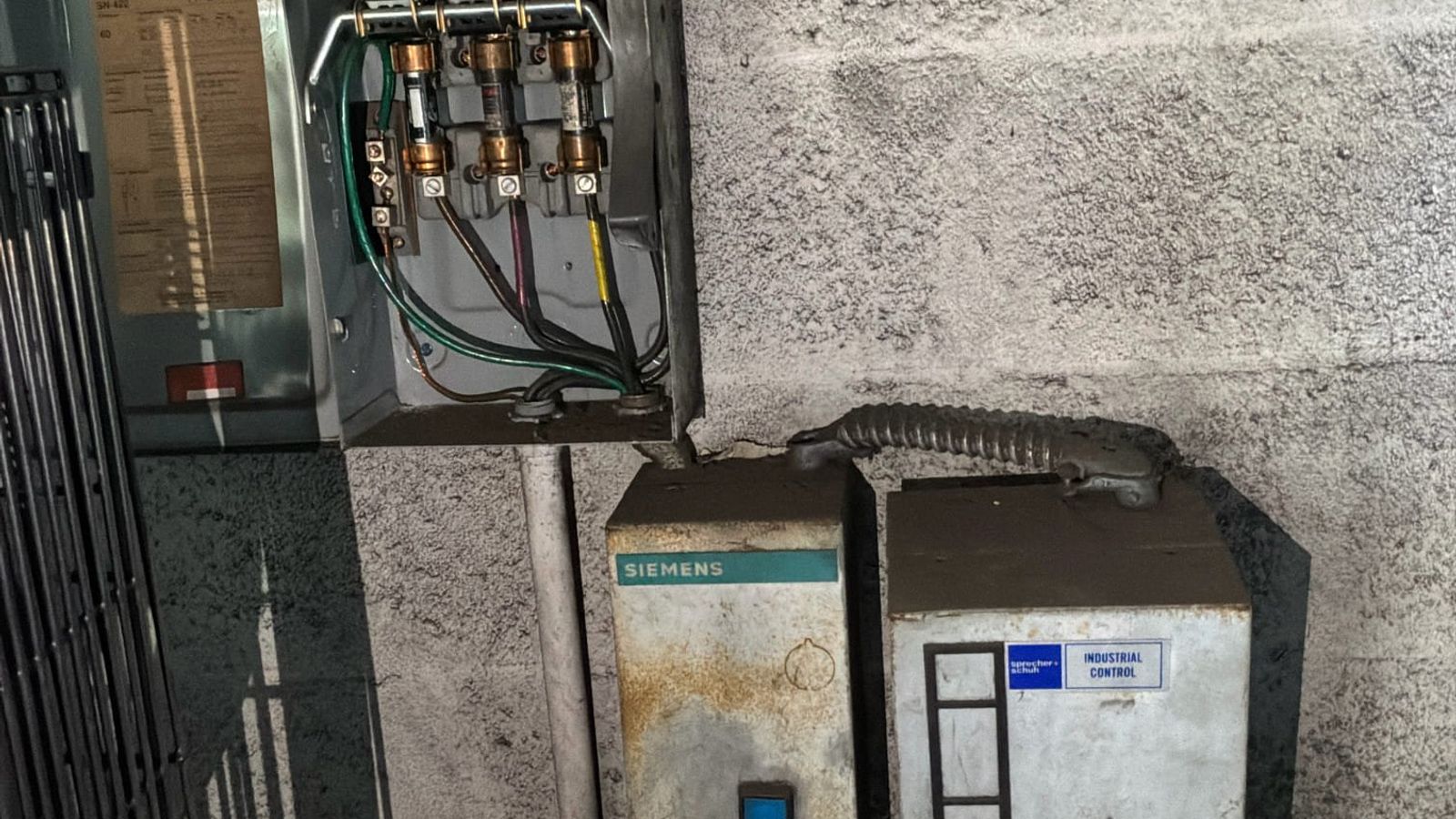 electrical-safety-inspection-hero - Orlando Electrician | Thomas Edison Electric Licensed Orlando electricians performing an electrical safety inspection, working through a home electrical safety checklist