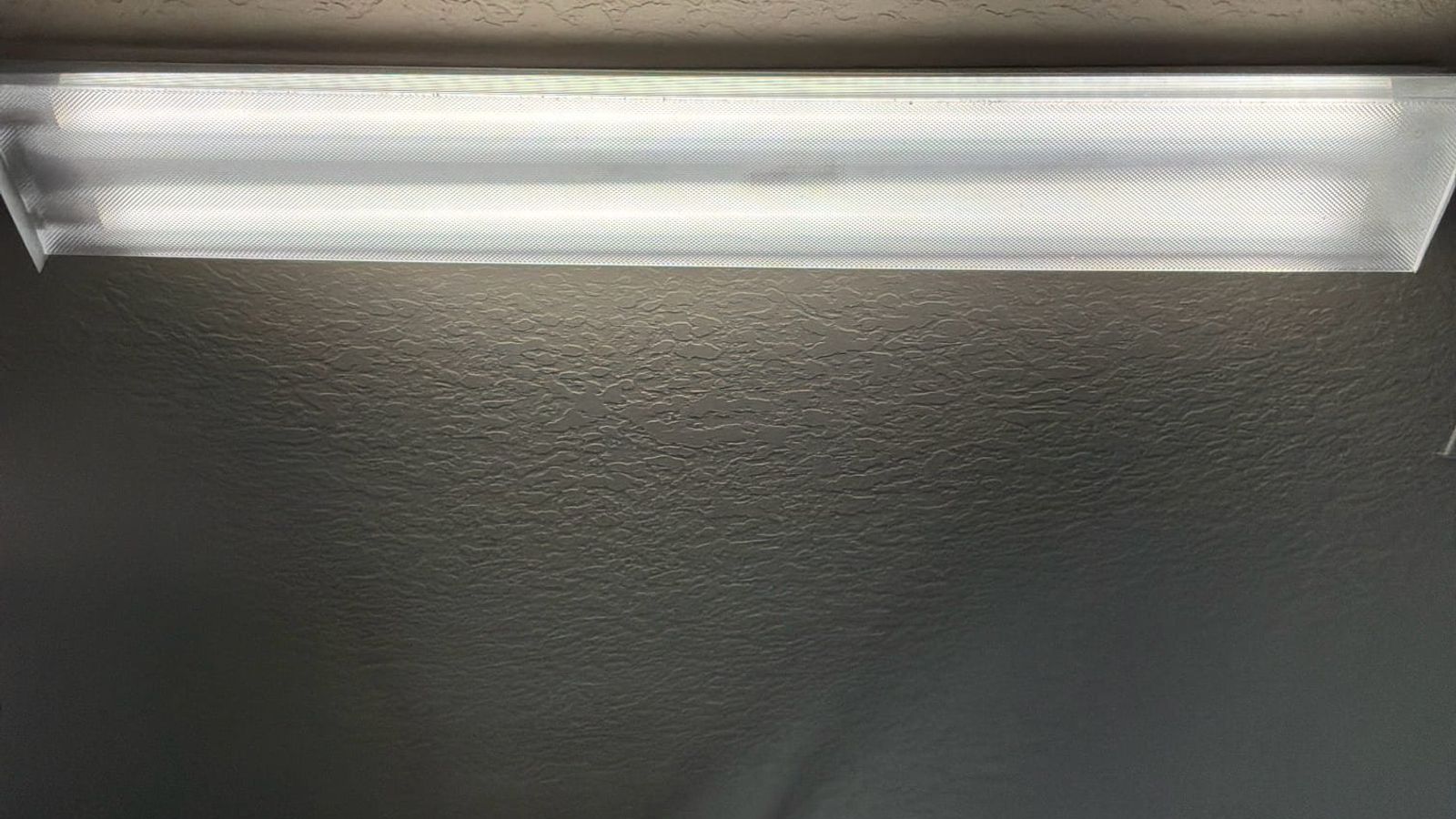 recessed-lighting-hero - Orlando Electrician | Thomas Edison Electric Licensed electricians installing recessed ceiling lights, the overhead layer that pairs with under cabinet lighting Orlando kitchens rely on