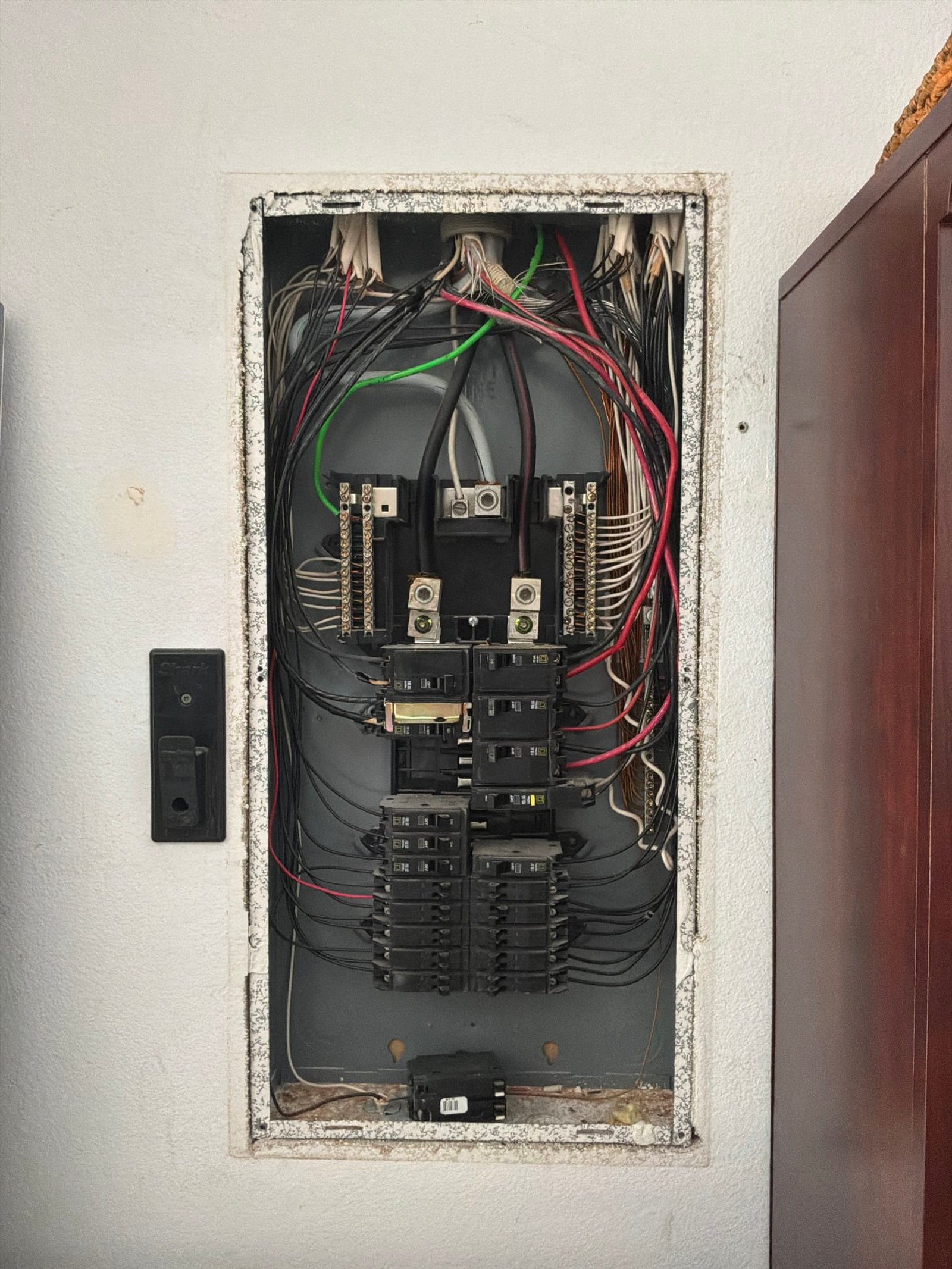 The original electrical panel documented before the work on an Outlet/GFCI-Repair/Replace job in Lake Mary, FL.
