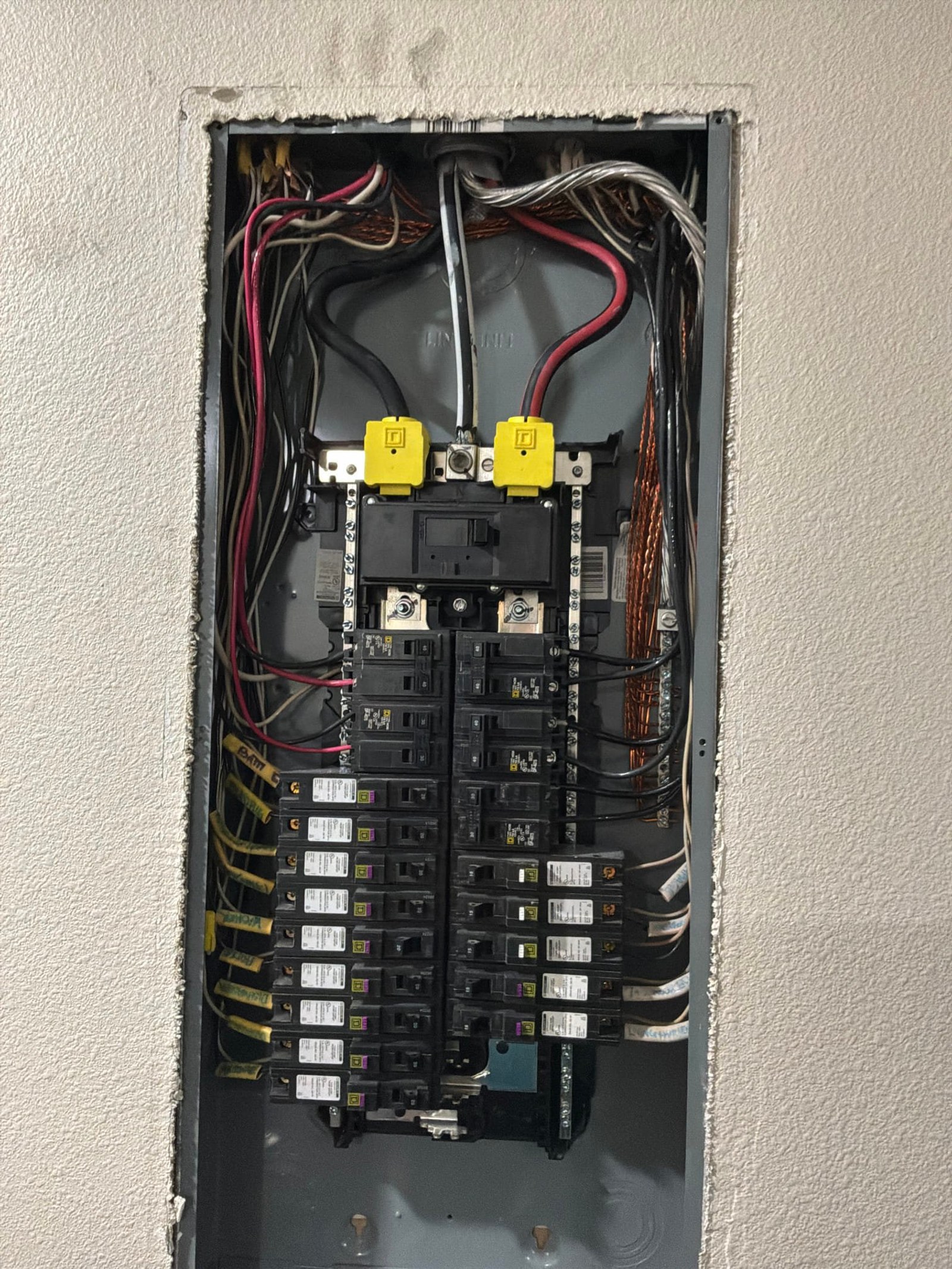 The inside of an electrical panel documented before the work on an Outlet/GFCI-Repair/Replace job in Orlando, FL.