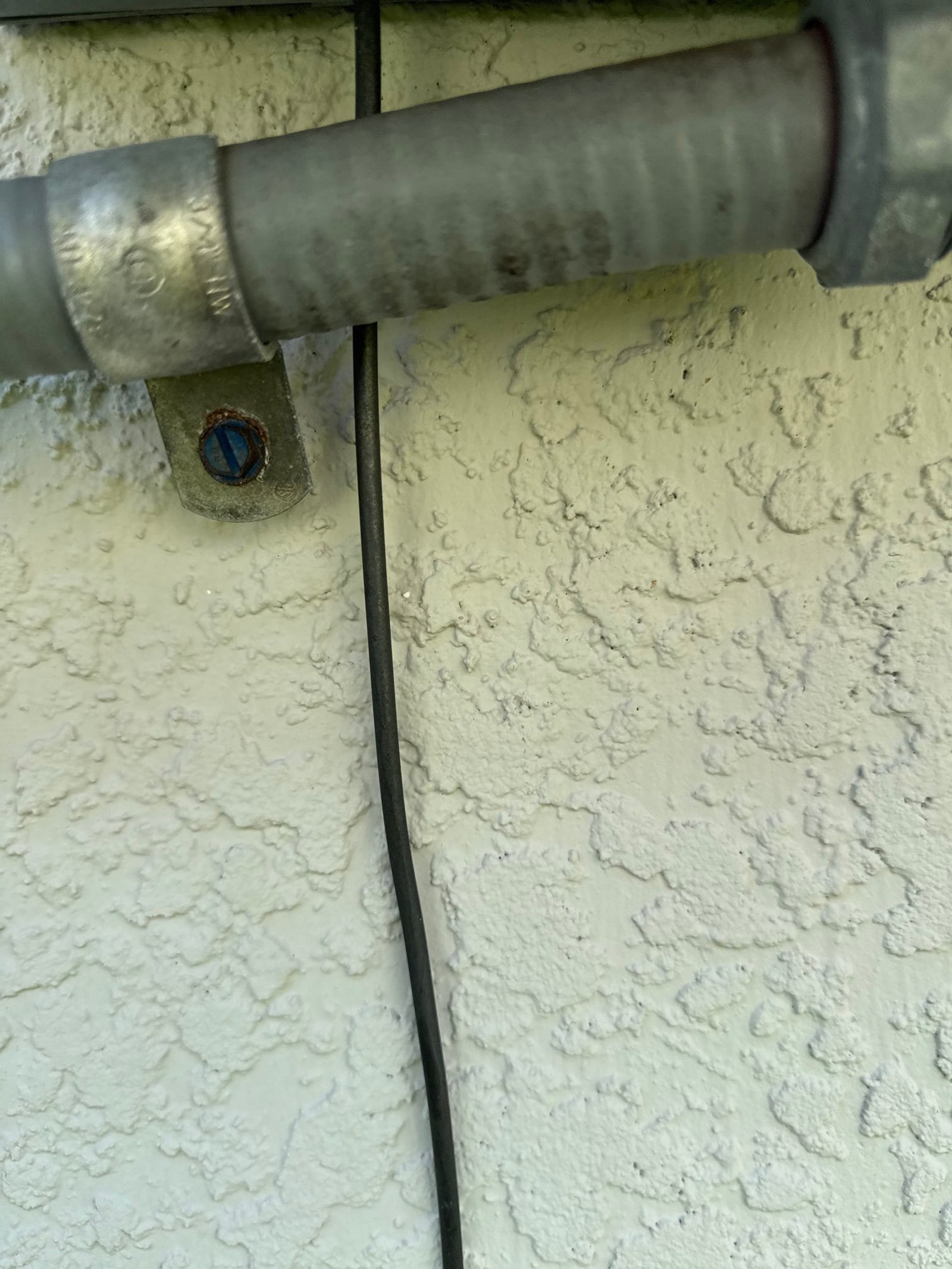 Conduit documented before the work on a Pool Wiring job in Oviedo, FL.