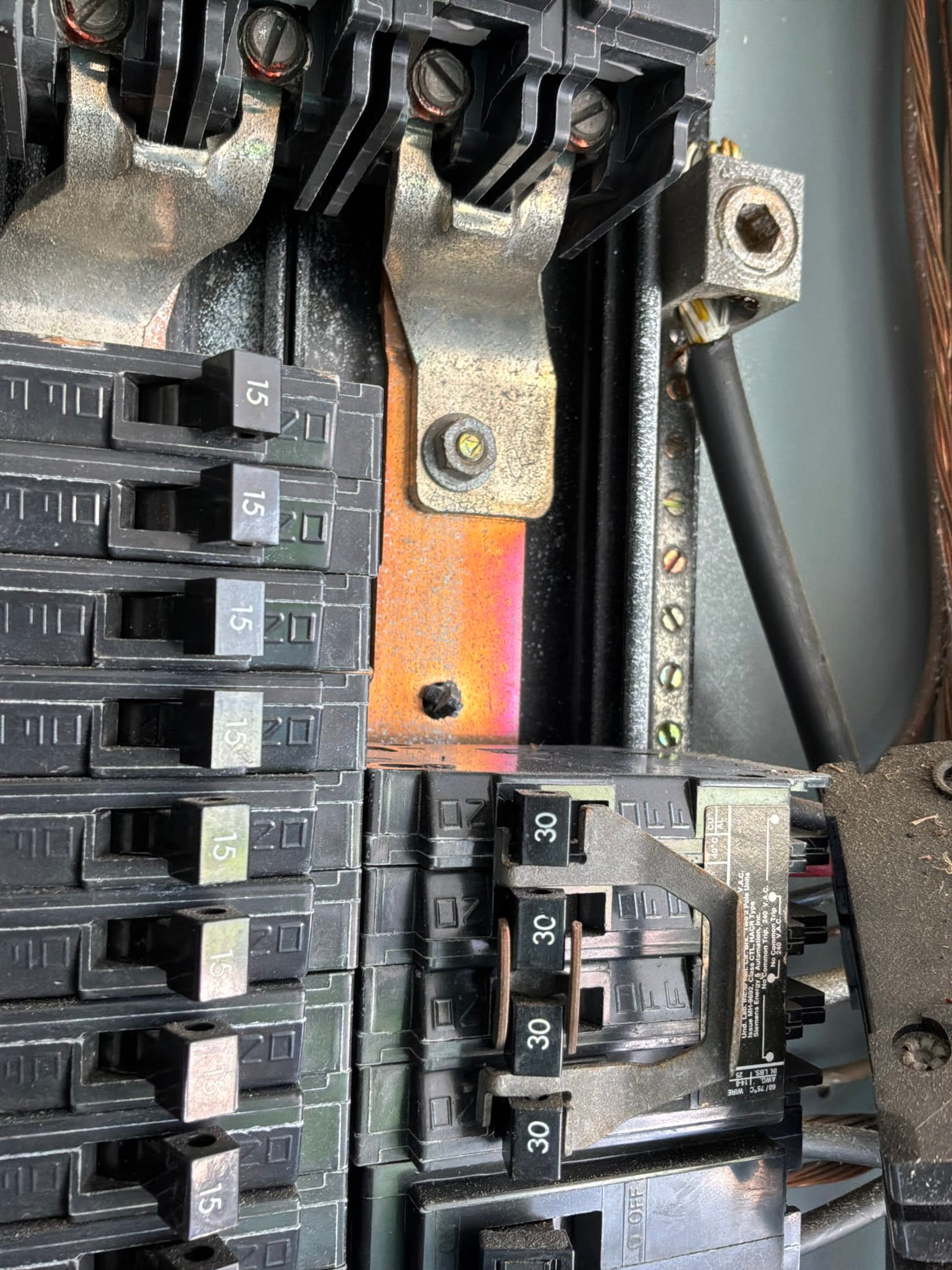 The original electrical panel documented before the work on a Pool Wiring job in Port Orange, FL.