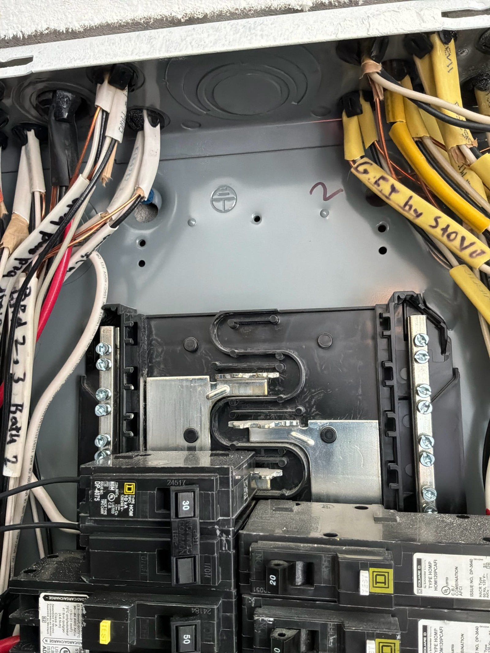 The inside of an electrical panel documented during the work on a Re-Wire job in Winter Garden, FL.